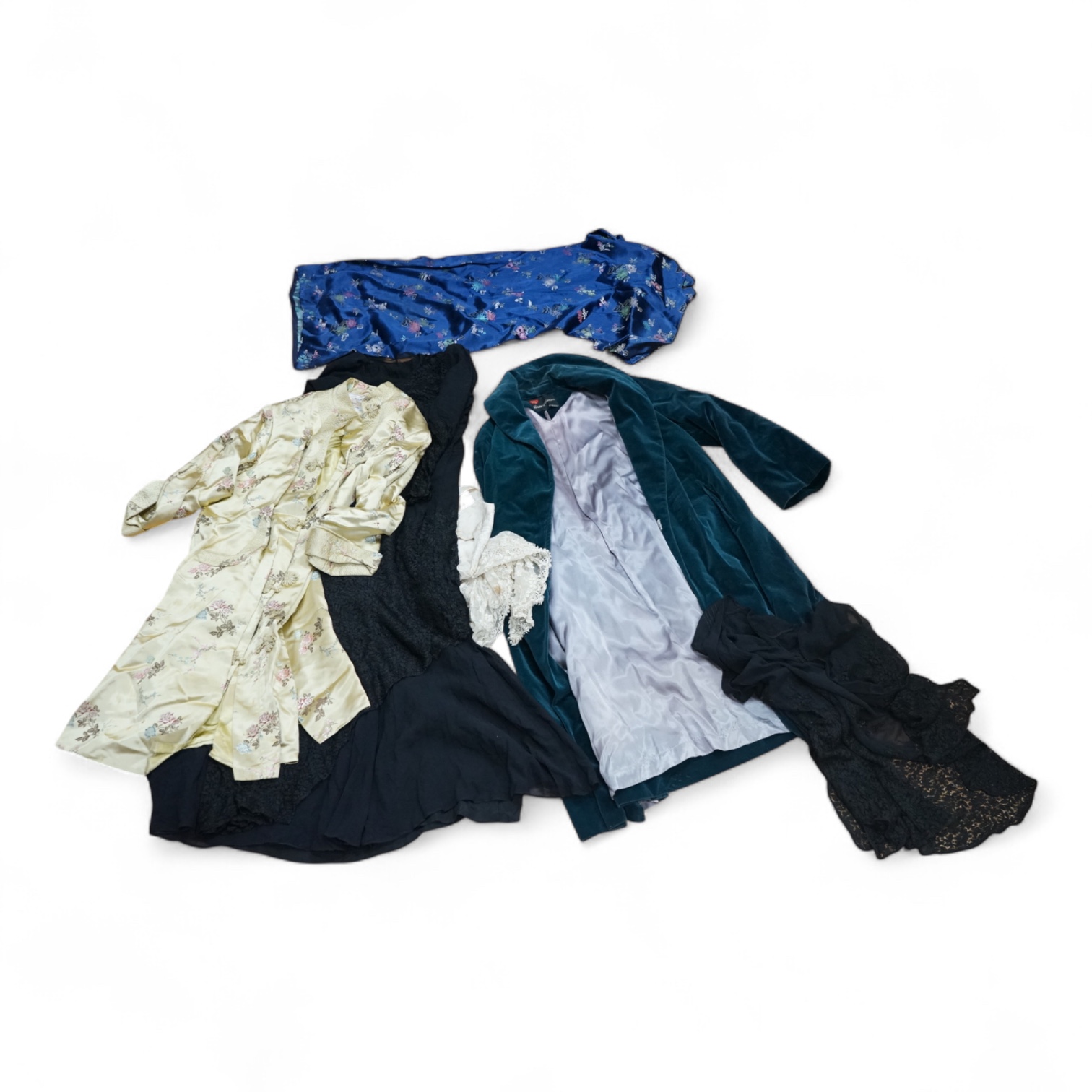 A 1950-60’s Chinese blue brocade dress and similar gold brocade coat, a green velvet coat, a 1930's black voile, lace inserted dress and jacket and two lace jabeau. Condition - the black lace and voile jacket torn.